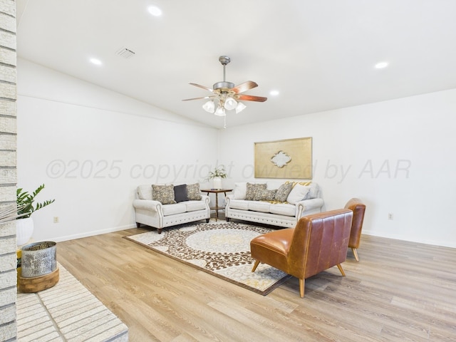 living room featuring recessed lighting, lofted ceiling, ceiling fan, and wood finished floors
