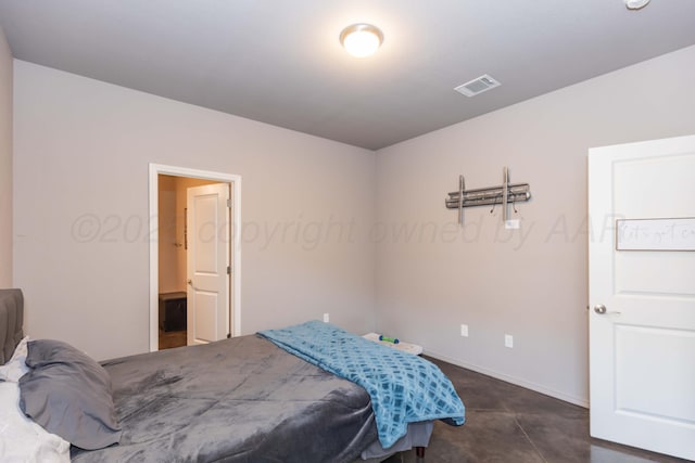bedroom featuring baseboards