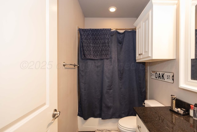 full bathroom with toilet, recessed lighting, and vanity