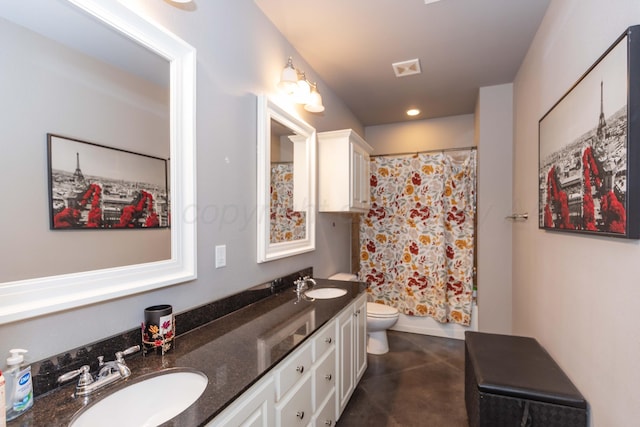 bathroom with toilet, a shower with curtain, double vanity, concrete flooring, and recessed lighting