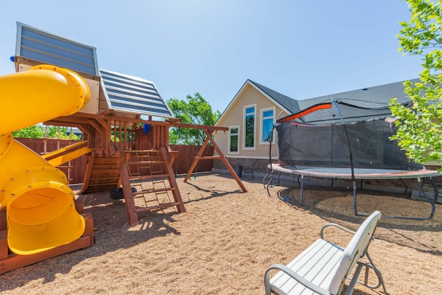 1401 N Dowell Rd, Amarillo, TX 79124 - view of play area featuring a trampoline and fence