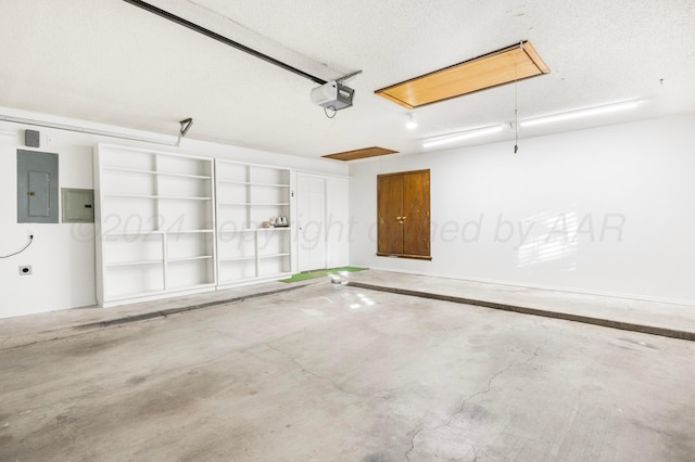 garage featuring a garage door opener and electric panel