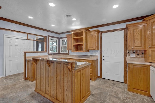 kitchen with tasteful backsplash, crown molding, light stone countertops, visible vents, and dishwasher