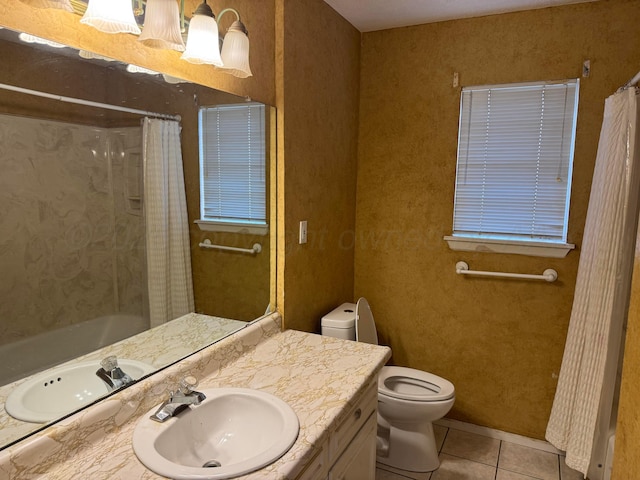 full bath with tile patterned floors, toilet, and vanity