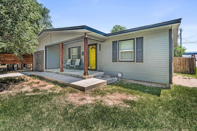 4639 S Hughes St, Amarillo, TX 79110 - view of front of property featuring an attached garage and a porch
