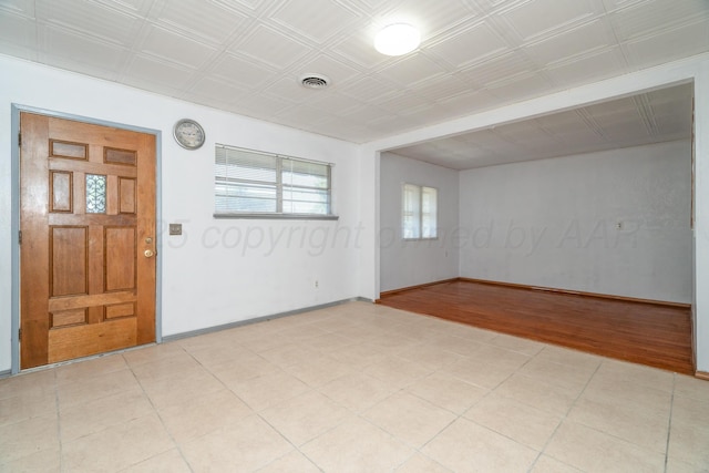 1608 Heather St, Amarillo, TX 79107 - empty room with baseboards and an ornate ceiling