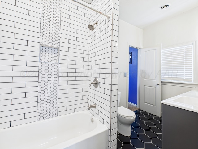 1206 N Russell St, Pampa, TX 79065 - full bath featuring vanity, toilet, bathing tub / shower combination, and tile patterned flooring