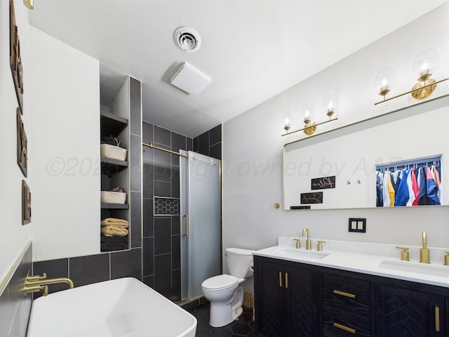 1206 N Russell St, Pampa, TX 79065 - bathroom with toilet, double vanity, tile patterned floors, and a tile shower