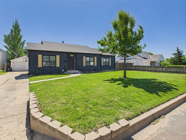 1206 N Russell St, Pampa, TX 79065 - ranch-style house with an outbuilding and a garage