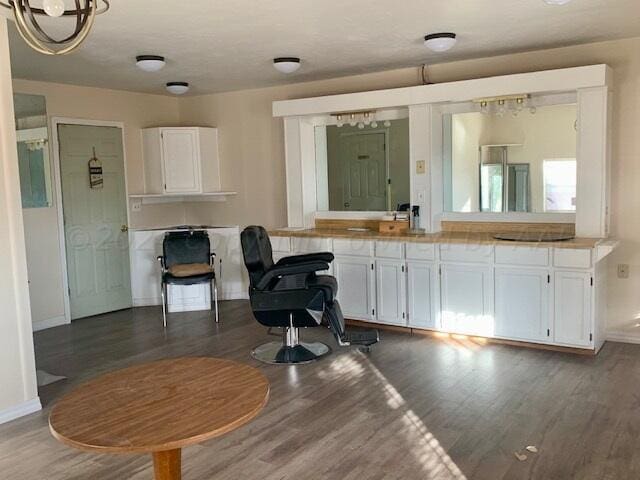 interior space with dark hardwood / wood-style floors