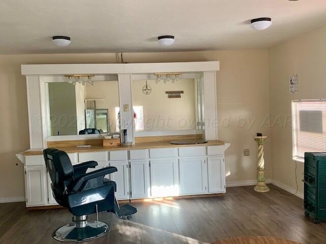 bathroom with hardwood / wood-style floors and vanity