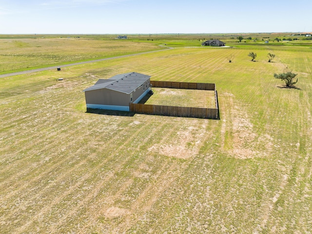 birds eye view of property with a rural view