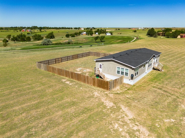 birds eye view of property featuring a rural view