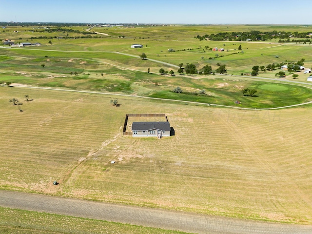 birds eye view of property featuring a rural view