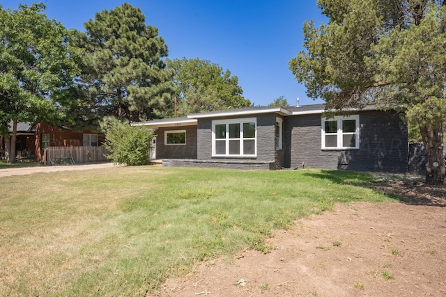 4832 SW 10th Ave, Amarillo, TX 79106 - view of front of property with a front lawn and stone siding