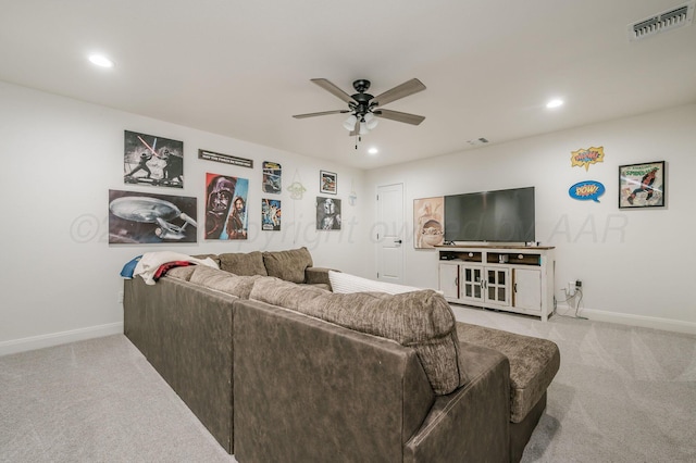 living area with ceiling fan, recessed lighting, light carpet, visible vents, and baseboards