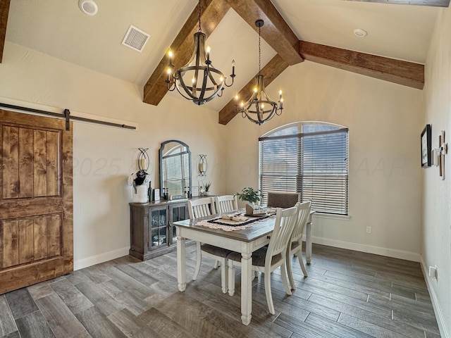 dining area with a barn door, a chandelier, and lofted ceiling with beams