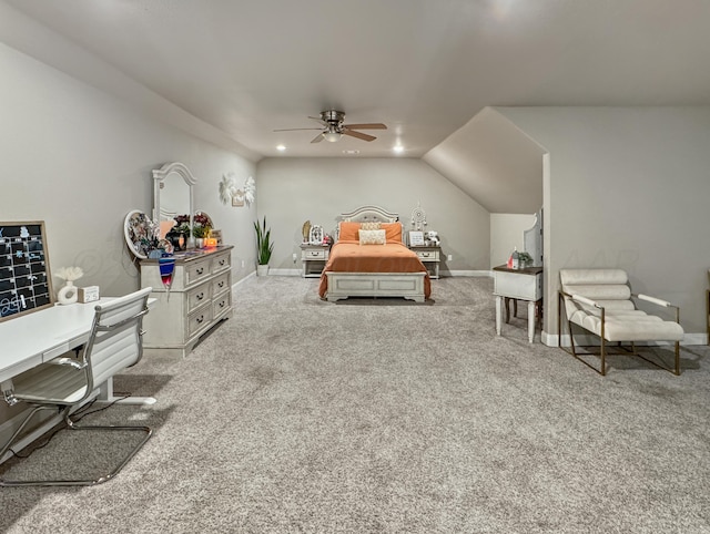 bedroom featuring vaulted ceiling, light colored carpet, and ceiling fan