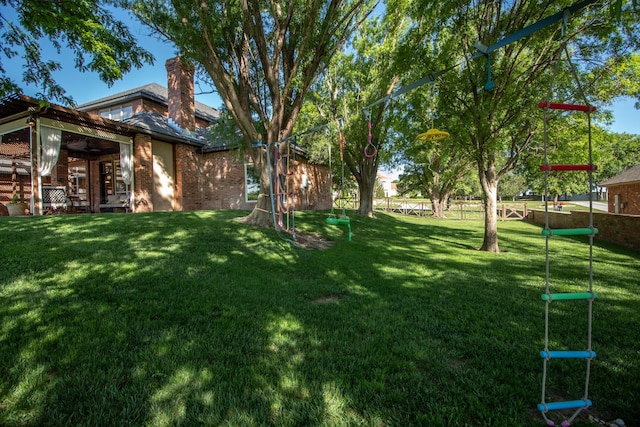 2112 Clubview, Amarillo, TX 79124 - view of green lawn featuring a ceiling fan