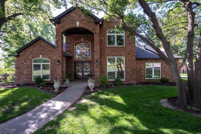 2112 Clubview, Amarillo, TX 79124 - traditional-style house with brick siding and a front lawn