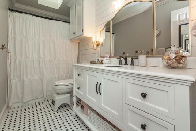 2112 Clubview, Amarillo, TX 79124 - full bath with ornamental molding, toilet, vanity, and tile patterned floors