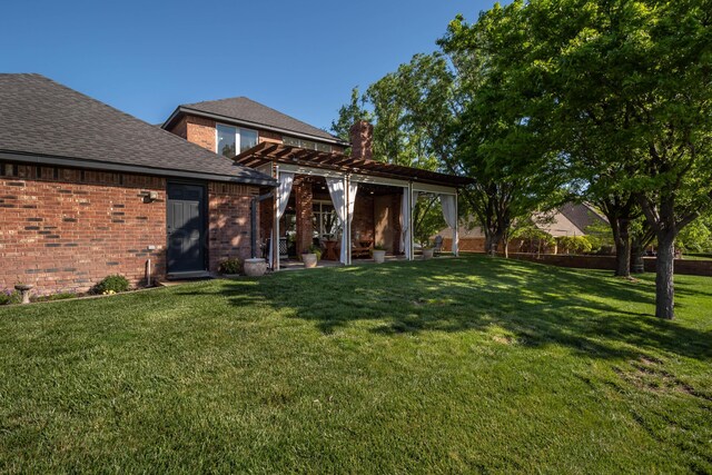 2112 Clubview, Amarillo, TX 79124 - back of property with a pergola, brick siding, and roof with shingles
