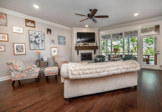 2112 Clubview, Amarillo, TX 79124 - living room with crown molding, a ceiling fan, dark wood finished floors, a large fireplace, and recessed lighting