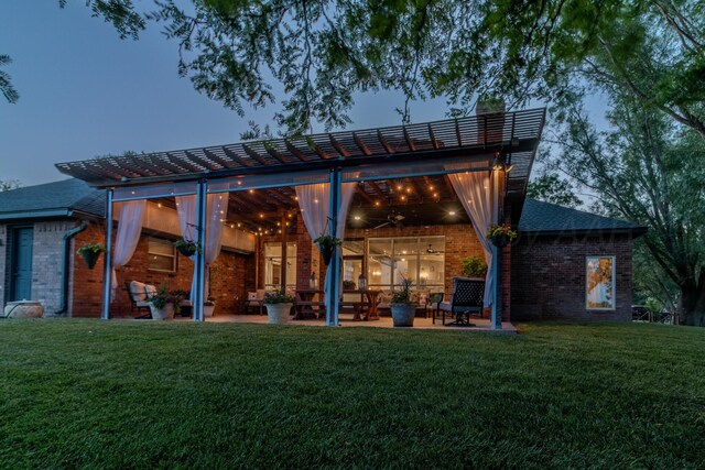 2112 Clubview, Amarillo, TX 79124 - rear view of house with brick siding, a lawn, and a patio