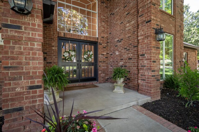 2112 Clubview, Amarillo, TX 79124 - doorway to property featuring french doors and brick siding