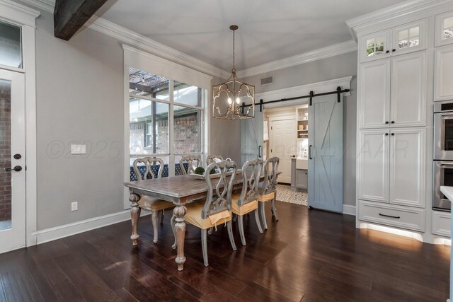 2112 Clubview, Amarillo, TX 79124 - dining space featuring a barn door, a chandelier, dark wood-style floors, crown molding, and baseboards