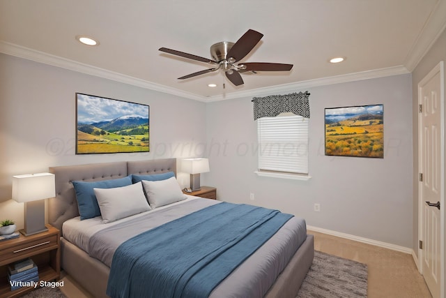 carpeted bedroom with ornamental molding and ceiling fan