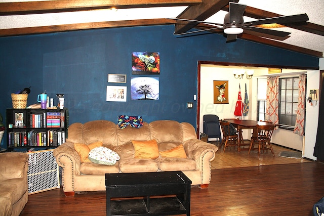 living room featuring vaulted ceiling with beams, wood-type flooring, and ceiling fan