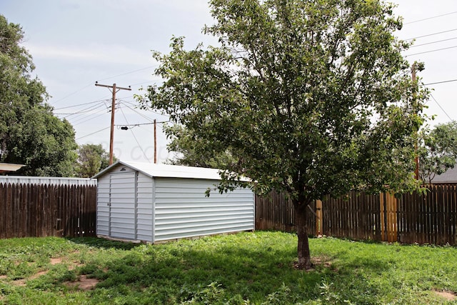 220 Hickory St, Hereford, TX 79045 - fenced backyard with a storage shed