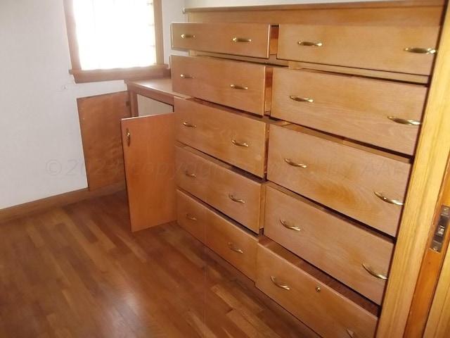 interior details with hardwood / wood-style flooring