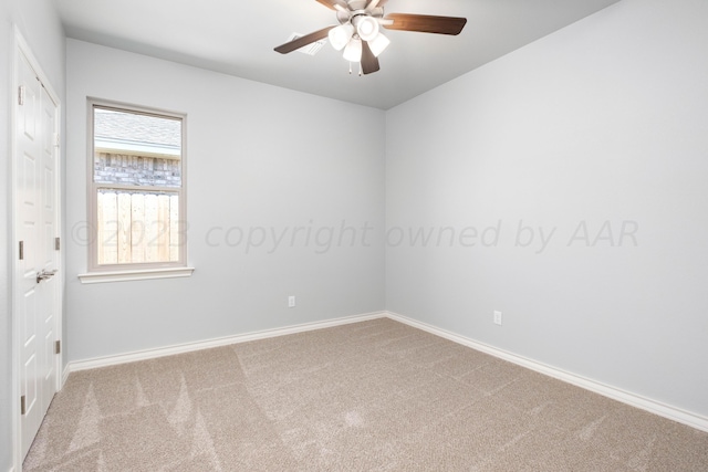 unfurnished room with light carpet and ceiling fan