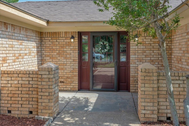 7104 Old Kent Rd, Amarillo, TX 79109 - entrance to property with brick siding and roof with shingles