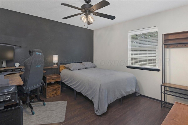 7104 Old Kent Rd, Amarillo, TX 79109 - bedroom featuring wood finished floors, ceiling fan, and an office area