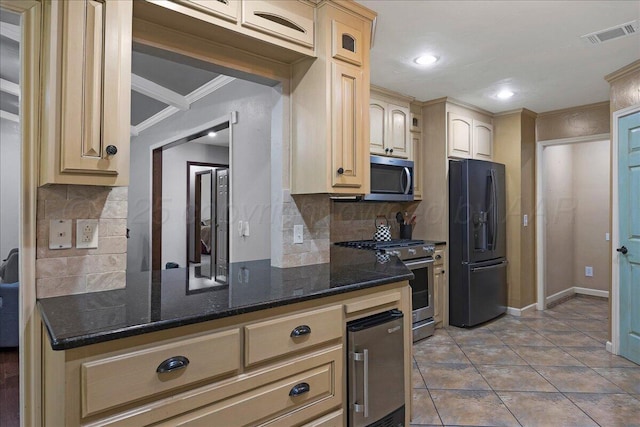 7104 Old Kent Rd, Amarillo, TX 79109 - kitchen featuring appliances with stainless steel finishes, ornamental molding, backsplash, recessed lighting, and dark stone counters