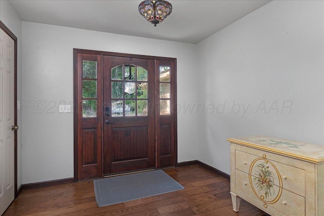 7104 Old Kent Rd, Amarillo, TX 79109 - foyer entrance featuring dark wood finished floors and baseboards