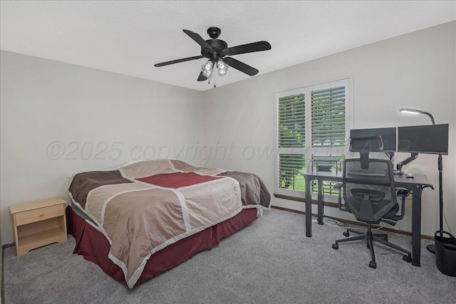 7104 Old Kent Rd, Amarillo, TX 79109 - bedroom featuring carpet, an office area, ceiling fan, and a textured ceiling