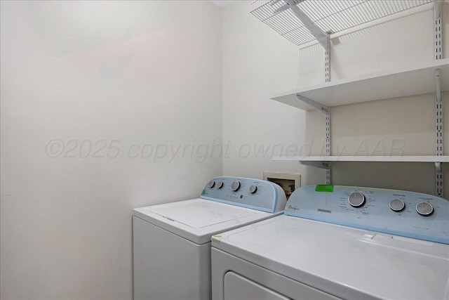 7104 Old Kent Rd, Amarillo, TX 79109 - laundry area featuring washing machine and clothes dryer