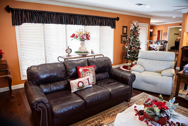 living room with ornamental molding and dark wood-type flooring