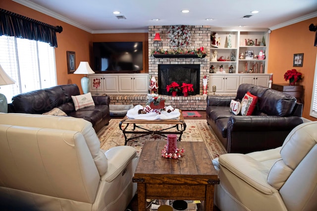 living room with built in features, a brick fireplace, and ornamental molding