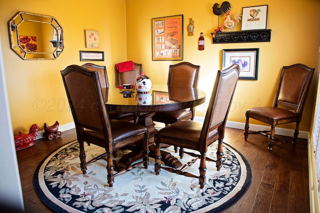 dining area featuring hardwood / wood-style floors