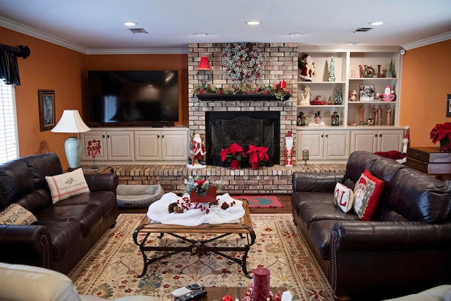 living room with a brick fireplace and crown molding