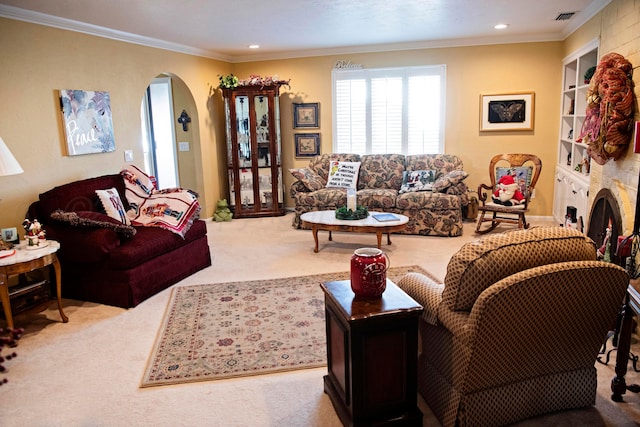 living room featuring built in shelves, light colored carpet, and crown molding