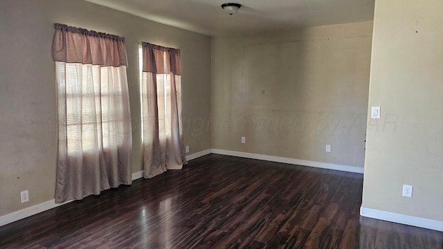 1300 Patton Cir, Borger, TX 79007 - unfurnished room with dark wood finished floors