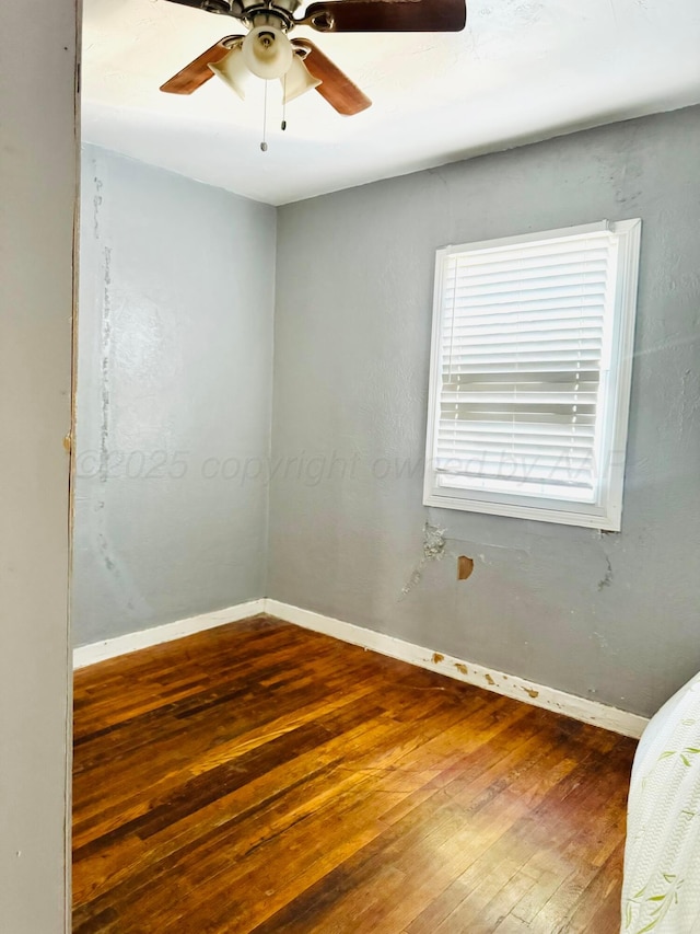 2400 SW 4th Ave, Amarillo, TX 79106 - spare room with hardwood / wood-style flooring, baseboards, and a ceiling fan