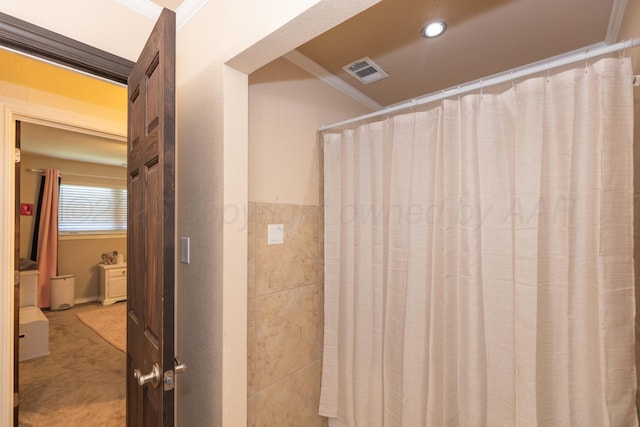 full bathroom featuring recessed lighting and a shower with shower curtain