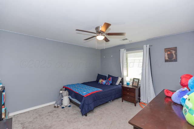 bedroom with light carpet, ceiling fan, and baseboards